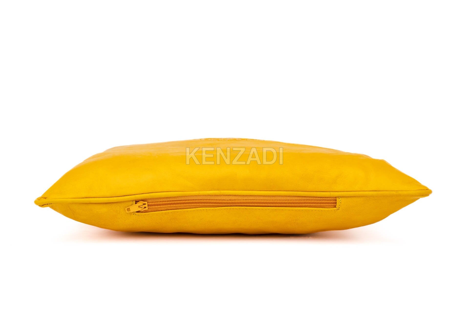 Handmade yellow leather pillowcase with Moroccan craftsmanship - stylish and versatile decor piece for indoor and outdoor use