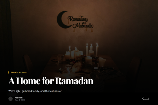 A softly lit Moroccan sitting room at dusk with a low iftar table, brass lanterns, and a grey
