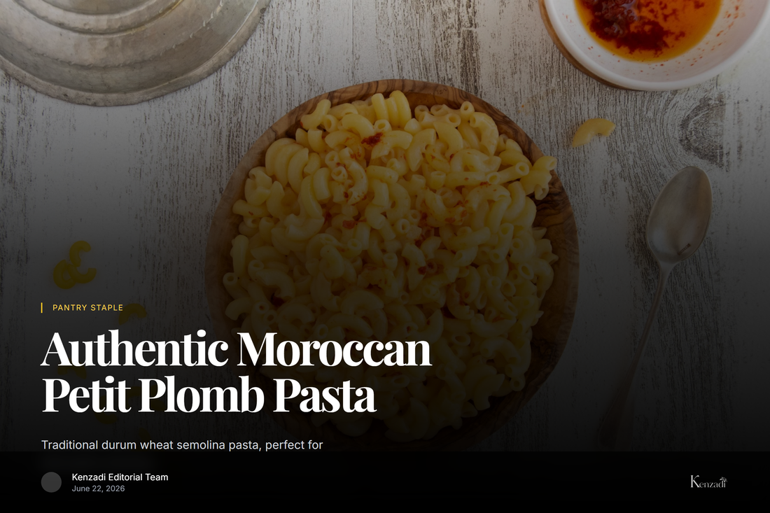 A close-up of golden Moroccan Petit Plomb pasta in a wooden bowl, with a spoonful held above it,