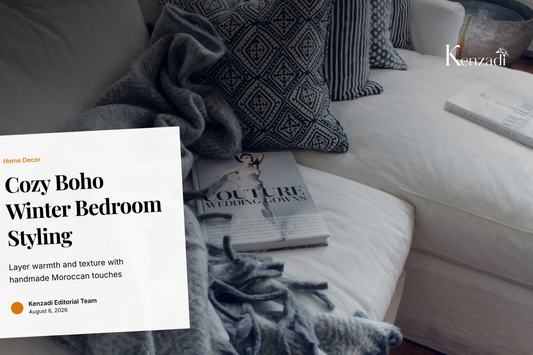 Grey Moroccan handmade pompom blanket with white pompoms draped on a Queen bed
