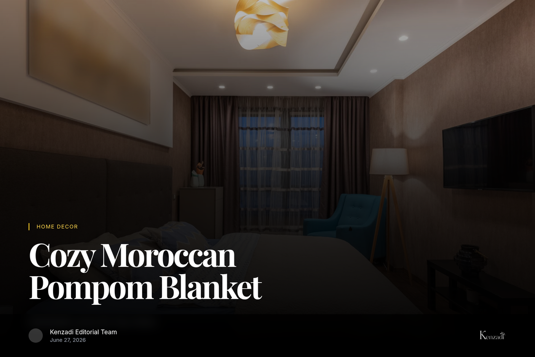 A luxurious brown Moroccan handmade pompom blanket draped over a bed, with soft lighting and natural textures.