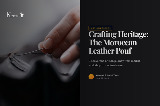 A craftsman's hands hand-stitching embroidery on a blue leather pouf in a traditional Moroccan workshop.