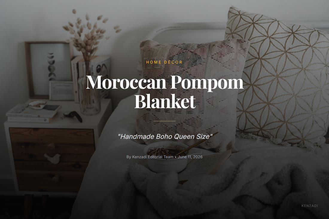White Moroccan handmade pompom blanket with brown pom-poms draped over a queen bed in a bright boho-style bedroom
