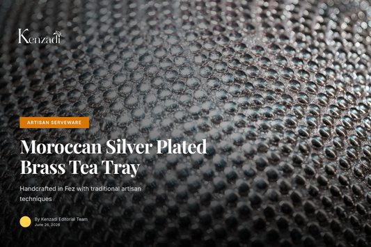 A close-up of a ornate silver plated brass serving tray with intricate engraved patterns, reflecting light, on a