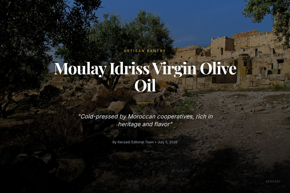 A glass bottle of golden Moulay Idriss Virgin Olive Oil on a wooden table, with a bowl of