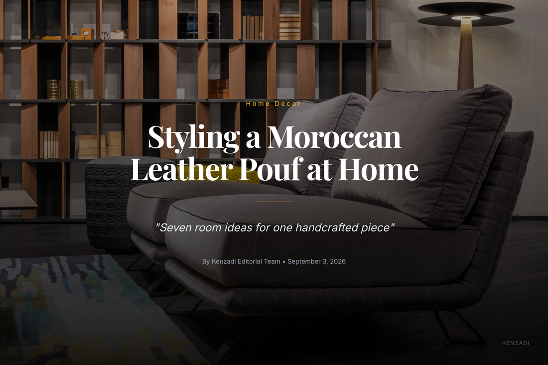 Round silver grey Moroccan leather pouf with grey embroidery styled in a living room