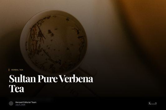 A warm cup of Sultan Pure Verbena Tea with tea bags and fresh verbena leaves on a wooden