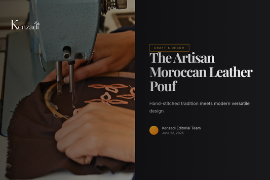 A craftsman's hands saddle-stitching a beautiful golden leather pouf in a Marrakech workshop, with other finished poufs in
