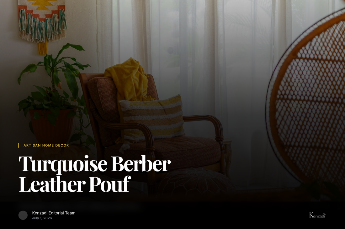 A vibrant turquoise round leather pouf with intricate beige embroidery on a textured rug in a bohemian-style living