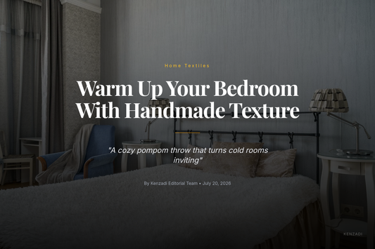 Pink Moroccan handmade pompom blanket draped over a bed in a cozy bedroom
