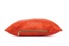 Handmade Moroccan orange leather pillowcase - a stylish and versatile decor piece for indoor and outdoor use.